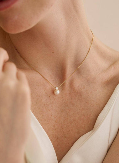 Elegant Pearl Necklace with Rhinestone Charm - Silver