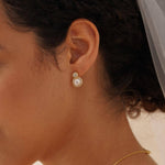 Elegant Natural Pearl and Rhinestone Studs - Gold